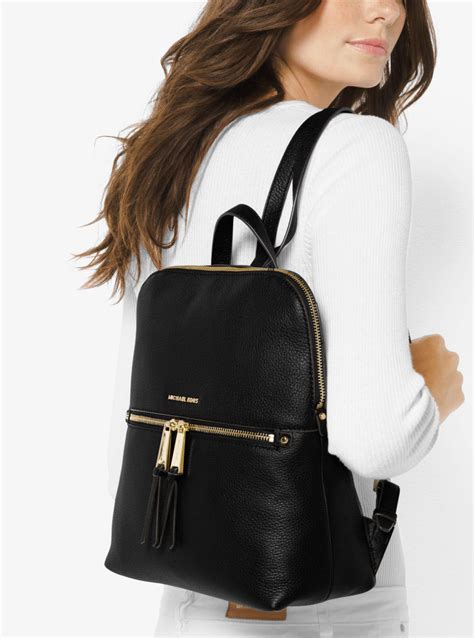 michael kors mini rhea backpack black|mk rhea slim backpack.